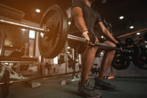 gloved grip on a loaded barbell